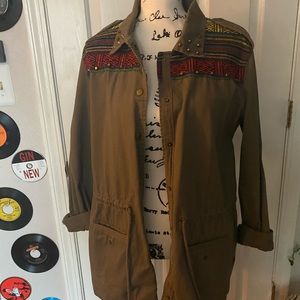 Brown coat with pops of color button up